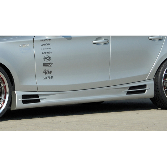 Rieger boční práh mont. strana levá pro BMW řada 1 E87 4-dvéř., sedan vč. faceliftu, r.v. 04/07-08/11, 09/04-03/07, plast ABS bez povrchové úpravy, s prolisem, s prolisem a dvěma výřezy Rieger boční práh mont. strana levá pro BMW řada 1 E87 4-dvéř., sedan vč. faceliftu, r.v. 04/07-08/11, 09/04-03/07, plast ABS bez povrchové úpravy, s prolisem, s prolisem a dvěma výřezy